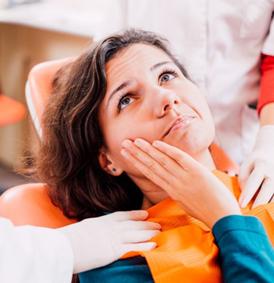 Woman at the dentist with a toothache