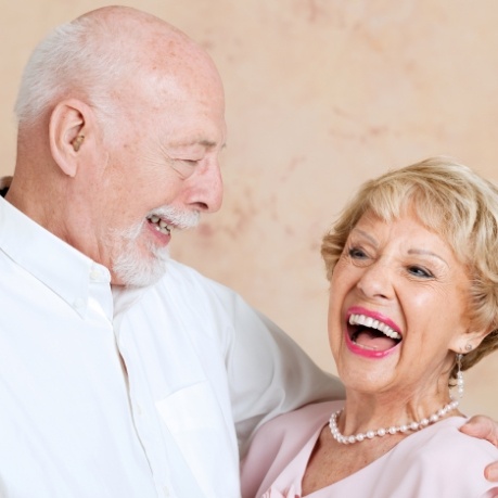 Laughing senior man and woman