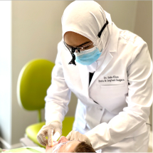 Doctor Khan treating a periodontal patient
